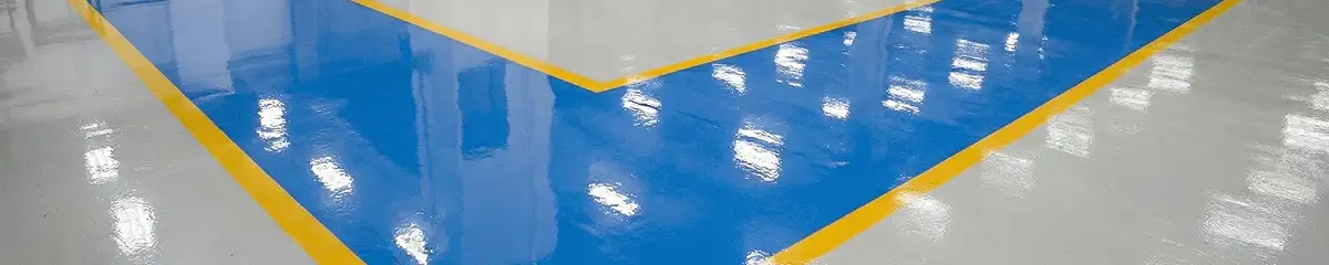 A factory floor professionally covered and marked with epoxy flooring in Bradenton, FL