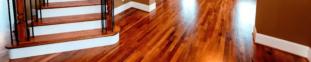 Base floor of a staircase with professionally restored wood flooring in Bradenton FL