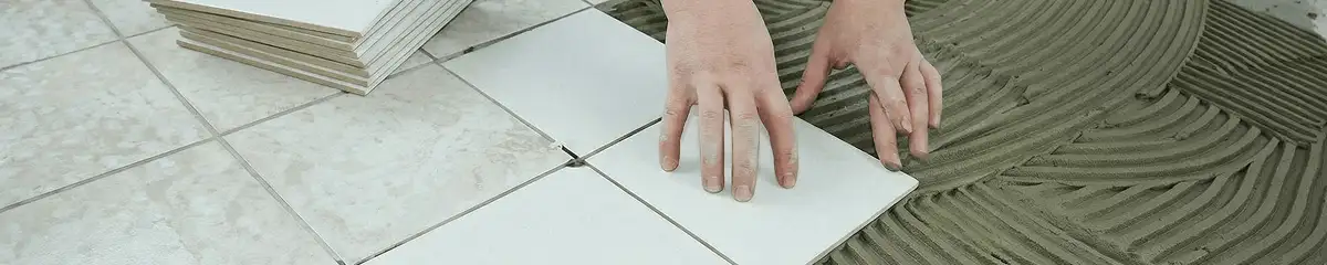 Professional installing white tile floors in Bradenton, FL