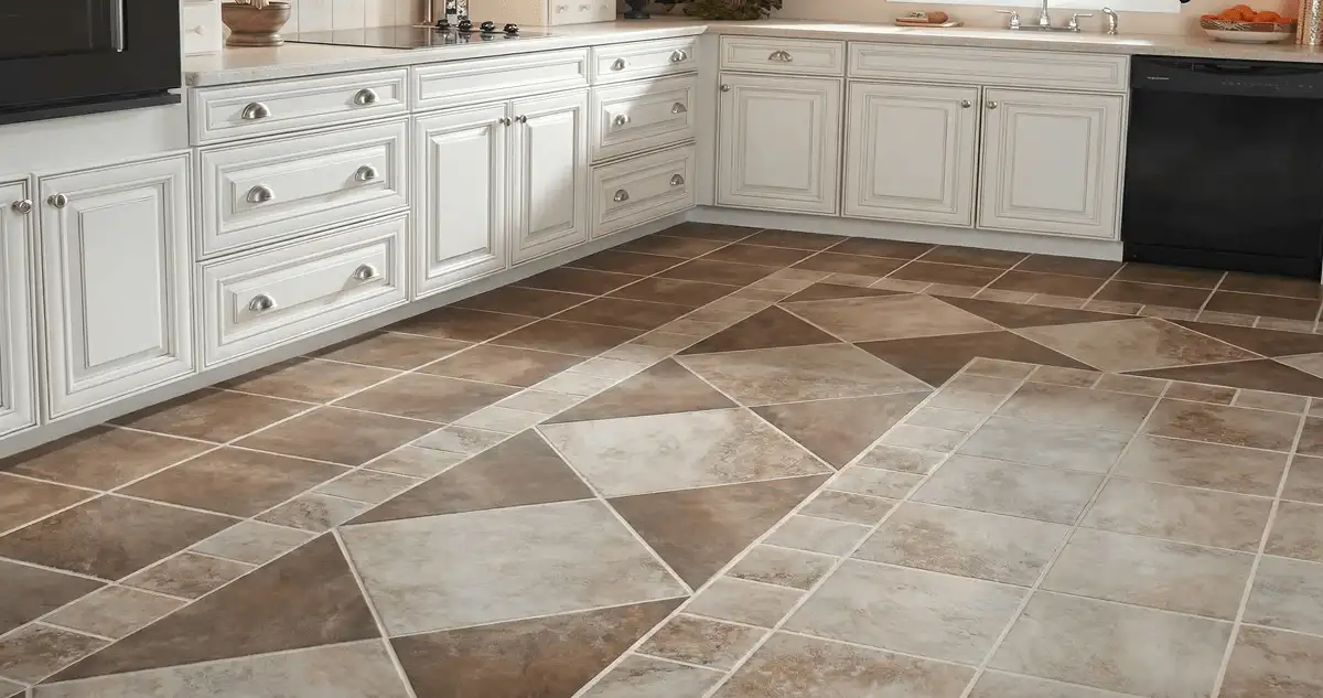 Kitchen with white cabinets and a professionally installed tile floor in Bradenton, FL