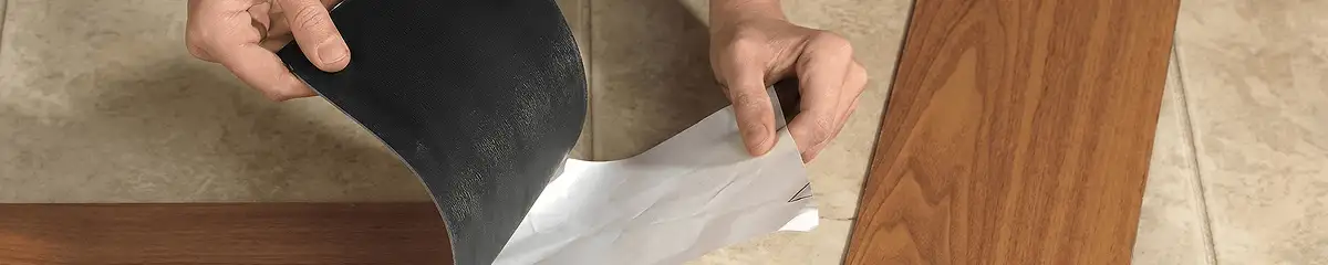 A professional installing vinyl flooring in Bradenton, FL